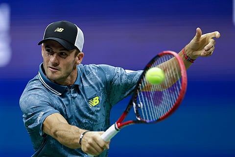 US Open Tennis: Tommy Paul, of the United States, returns a shot to Jannik Sinner, of Italy